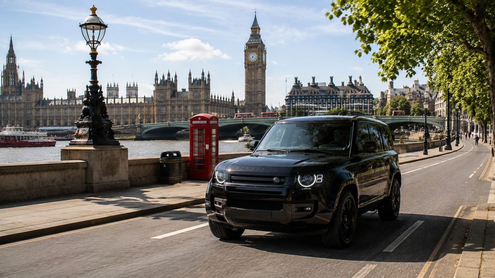 A black Defender on the Embankment, the Houses of Parliament and Big Ben across the river